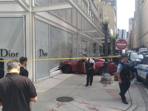 Red Sports Car Crashes Into Dior Store Downtown, Driver 